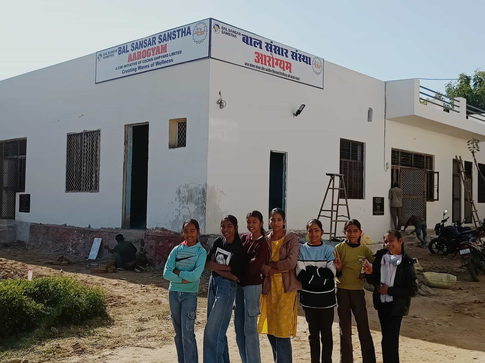 Aarogyam Kendra health centre building with signboard in Ajmer