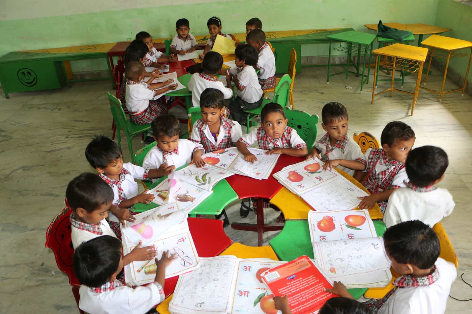 Pre-primary children reading at Bal Sansar Public School