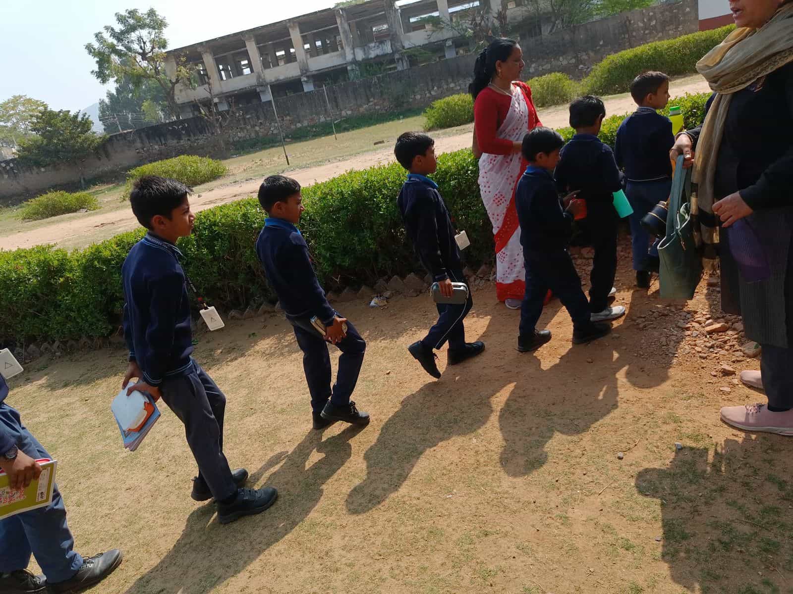 BSPS girls in winter uniform outside the school building