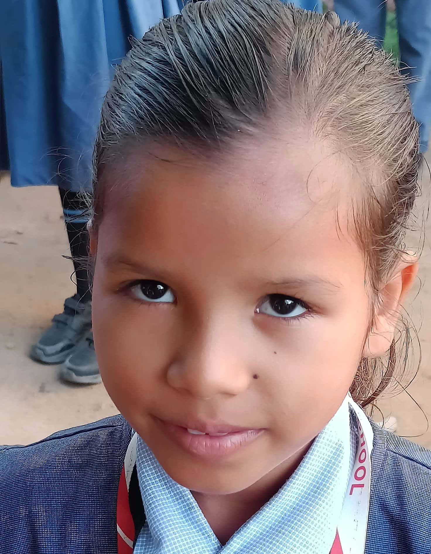 Close-up portrait of a BSPS pupil in her school uniform