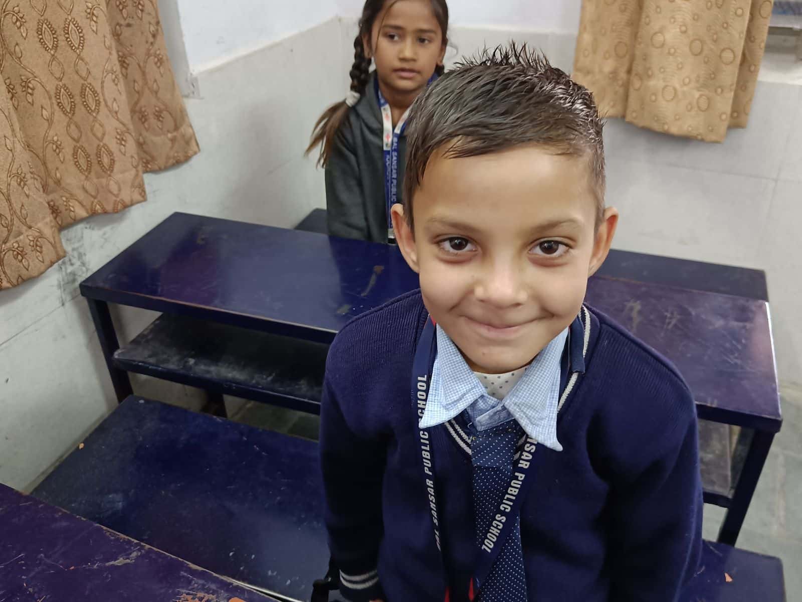 BSPS student portrait with school lanyard