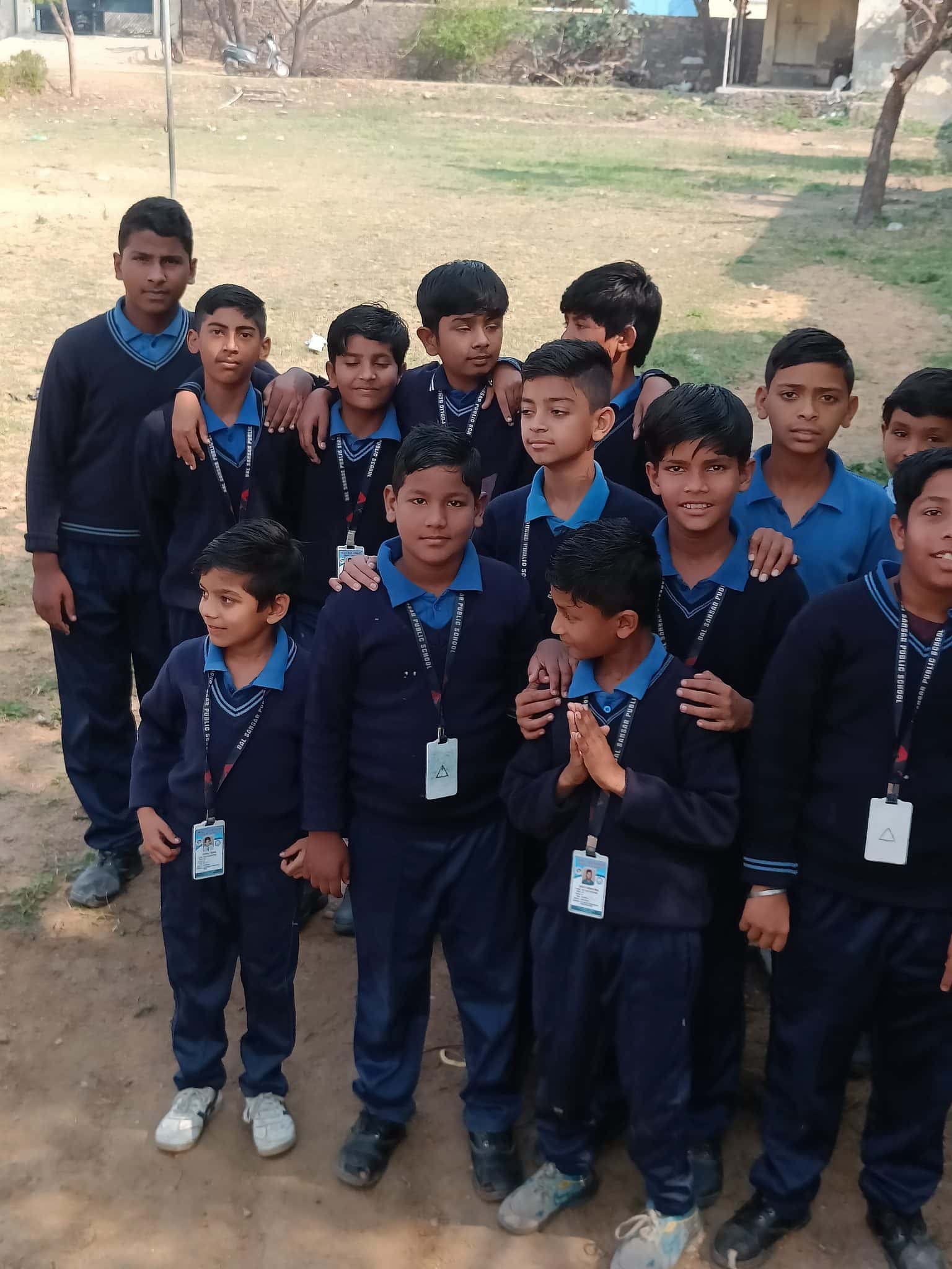 BSPS boys in winter uniform gathered outdoors