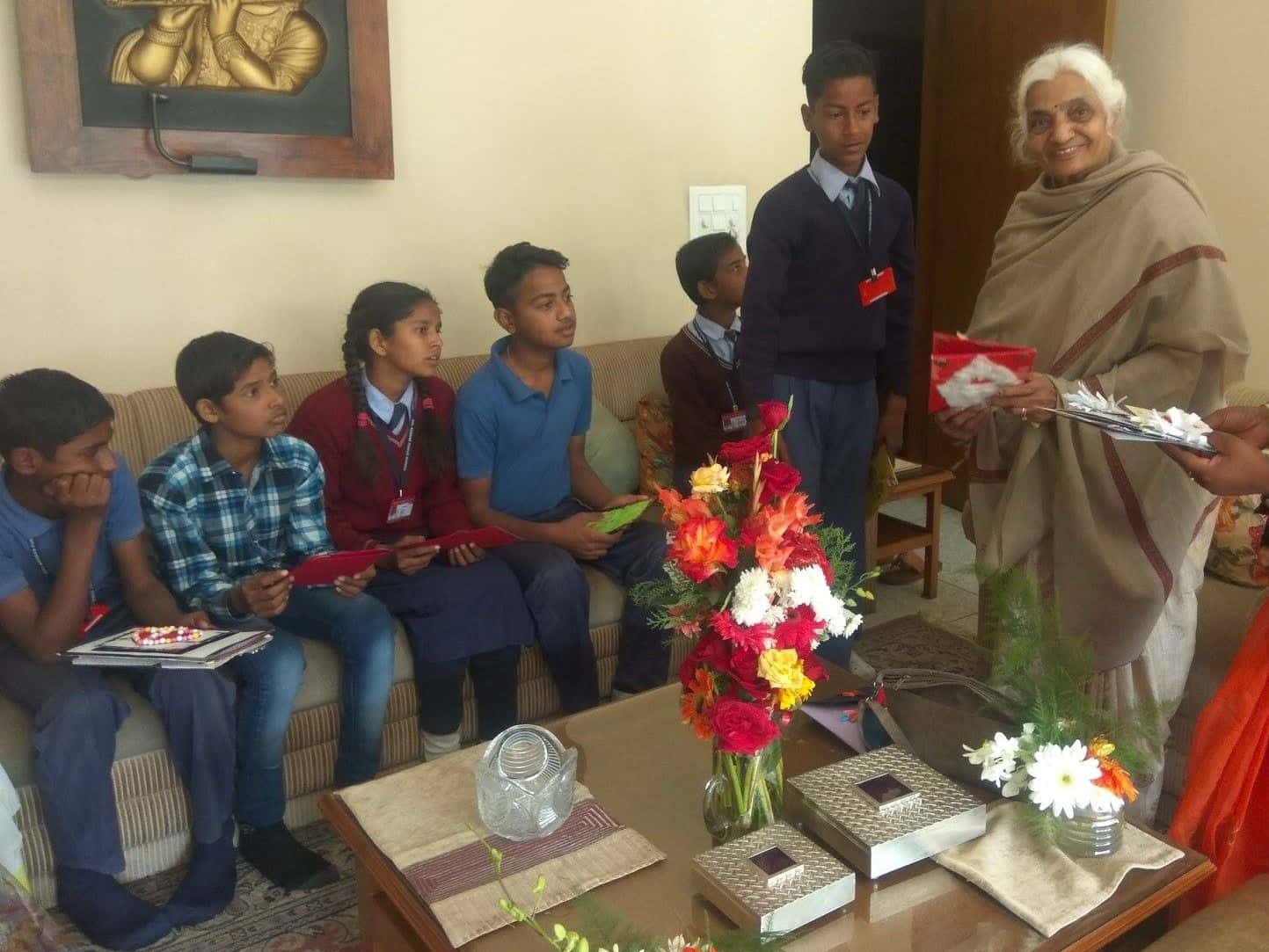 Students visiting and gifting elderly community members