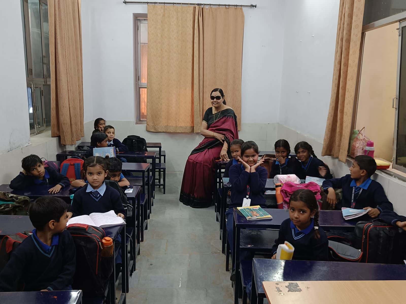 Teacher and students sharing a warm moment in the classroom